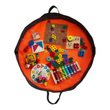 Sac de rangement BenRange déployé à plat, jouets en bois disposés dessus